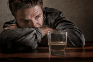 Man drinking alcohol while considering alcoholism facts - Northpoint Recovery