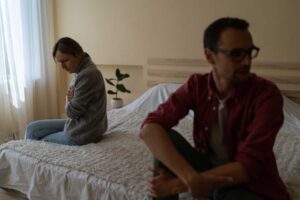 Someone starting to confront a loved one about signs of pill addiction