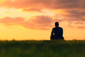 a person looks at the sunset while pondering tips for co-dependency