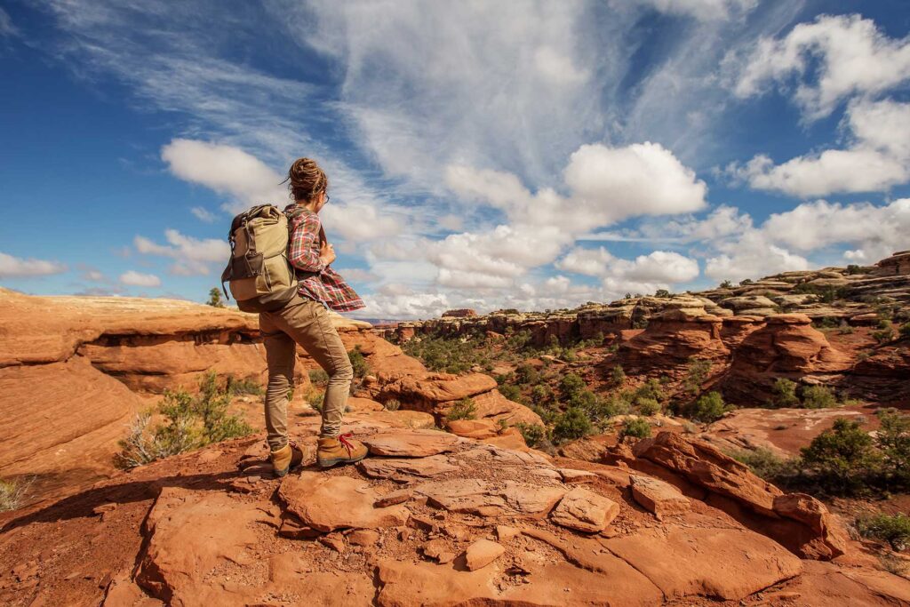 Person outdoors following the 12-Step Principles of Recovery