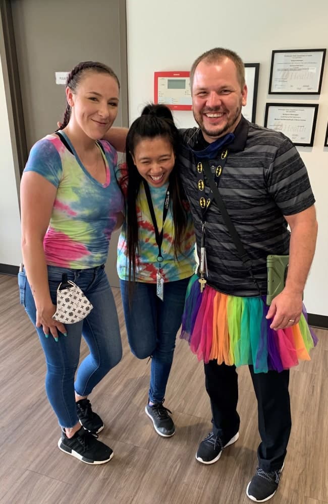 group-with-tie-dye-shirts-and-skirt