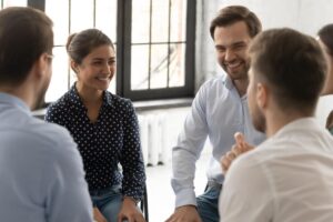 People sitting in a circle, feeling the importance of alcohol detox in their lives