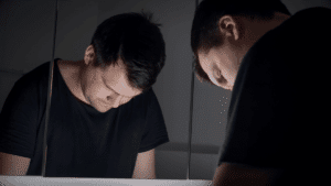 a man contemplating 5 facts about cocaine addiction