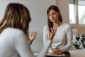 Two women discuss treatment options for anxiety treatment with xanax and buspar