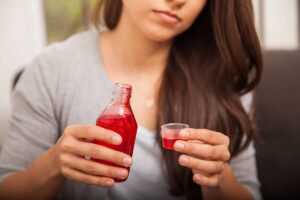 A woman addicted to cough syrup