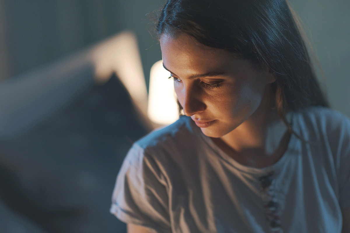 A woman realizing her life is out of control due to addiction